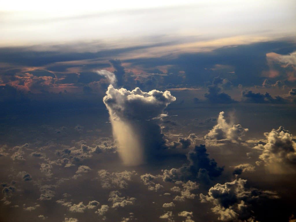 Partly Cloudy with Slight Chance of Rain Showers Tonight